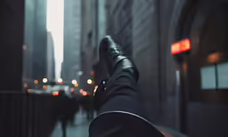 someone standing on a street with the view from behind