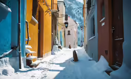 the back side of a narrow alley that is almost completely covered in snow
