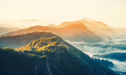 fog and low lying hills in the background