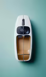a photo of a small boat mounted on a wall