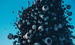 many large black and white balls hanging in the air