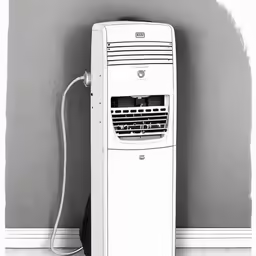 a white electric heater on a gray wall