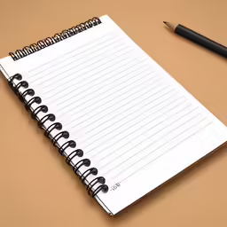 a spiral notebook on top of a desk with a pencil in it