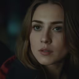 a close up of a person in a black jacket