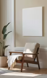a room with a chair, potted plant and a large piece of artwork