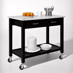 a black trolley with two dishes and oranges