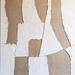 the wall is broken down and the paper has been left on
