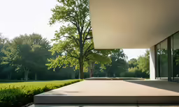 empty outdoor concrete floor outside the front of an modern house