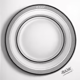 the back side of a white plate with a grey stripe