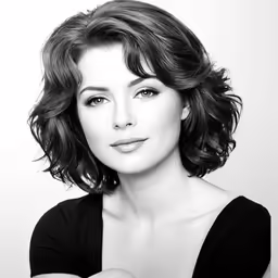 a beautiful young lady with her arms crossed