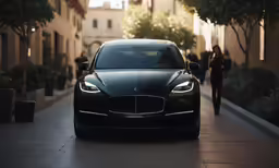 an expensive vehicle is parked on the side of the street