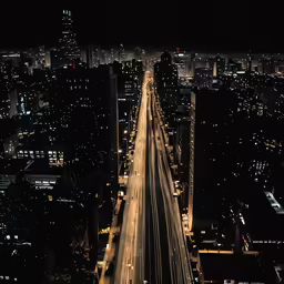 an overhead view of the city streets at night