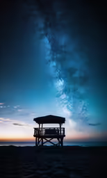the view of a body of water with a building on it and stars above