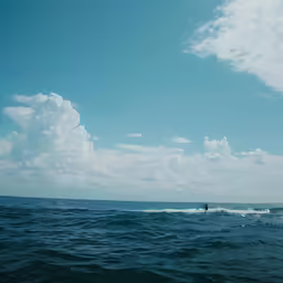 a man who is para sailing on some water
