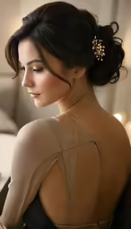 a woman with an updo in a formal dress