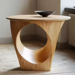 a wooden table that is in a room