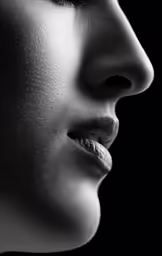 a woman with her lips open wearing piercings