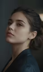 a beautiful young lady with a black shirt on