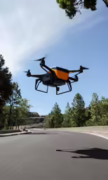 a black and yellow aerial device in the air