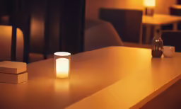 this is a picture of an empty candle in the corner