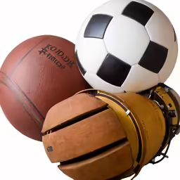 three different types of soccer balls in the air