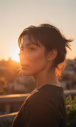 a woman standing on top of a street in the sun