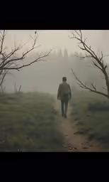 a man walking down a path in the woods