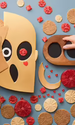 someone holding onto a paper turkey cut out to look like he is looking at his eyes