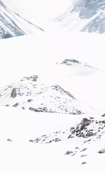 snow boarder on snowy mountain during winter day