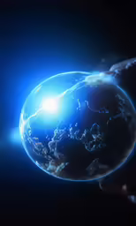 an image of a hand holding up a planet