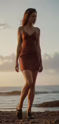 a girl is walking alone on the beach