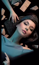 a woman is posed with diamond jewelry on her head