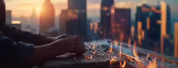someone at a table using fire with skyscrapers in the background