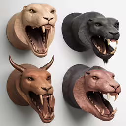 three masks of various animal faces with sharp teeth