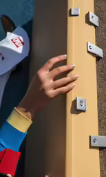a person with nail polishing on their nails is holding onto some mail