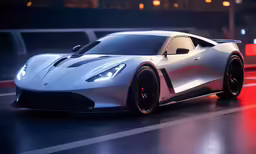 a silver sport car driving down a city street