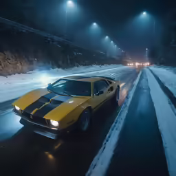 a yellow race car in the snow on a dark road