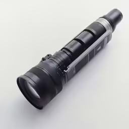 a large camera lens sitting on top of a table
