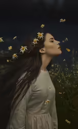 a woman is standing in the grass with dandelions