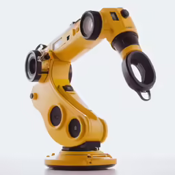 a yellow robotic arm on a table