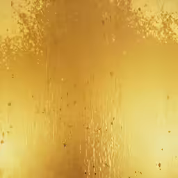 yellow dust and drops on the surface of water