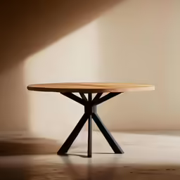 the round wooden table is against a neutral wall