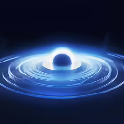 a black object surrounded by smaller white circles