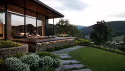 the outside of the modern home overlooks the valley and mountains