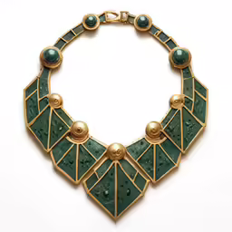 an emerald and gold - plated necklace