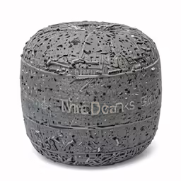 an artisticly designed black and silver ottoman cover