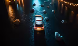 a car is parked in a alley during the night