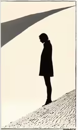 the silhouette of a person standing on a dune