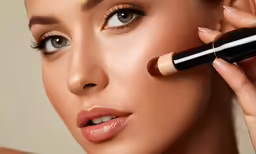 woman getting ready for a new makeup trend with conceal