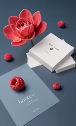 there is a single flower and some berries on the table